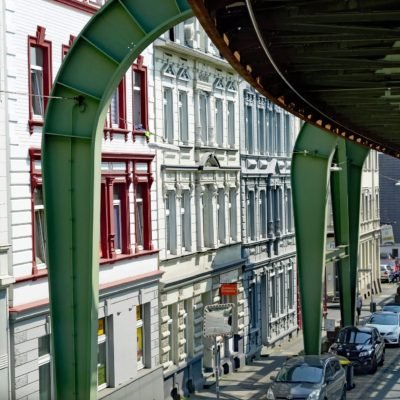 Floating railway in Wuppertal in front of house facades